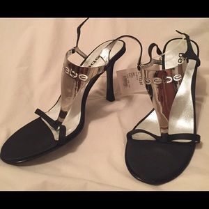 Black Bebe shoes with silver accents
